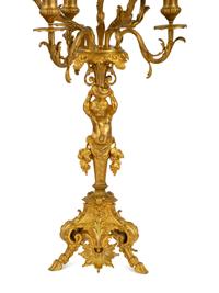 A Pair of Gilt Bronze Figural Seven-Light Candelabra