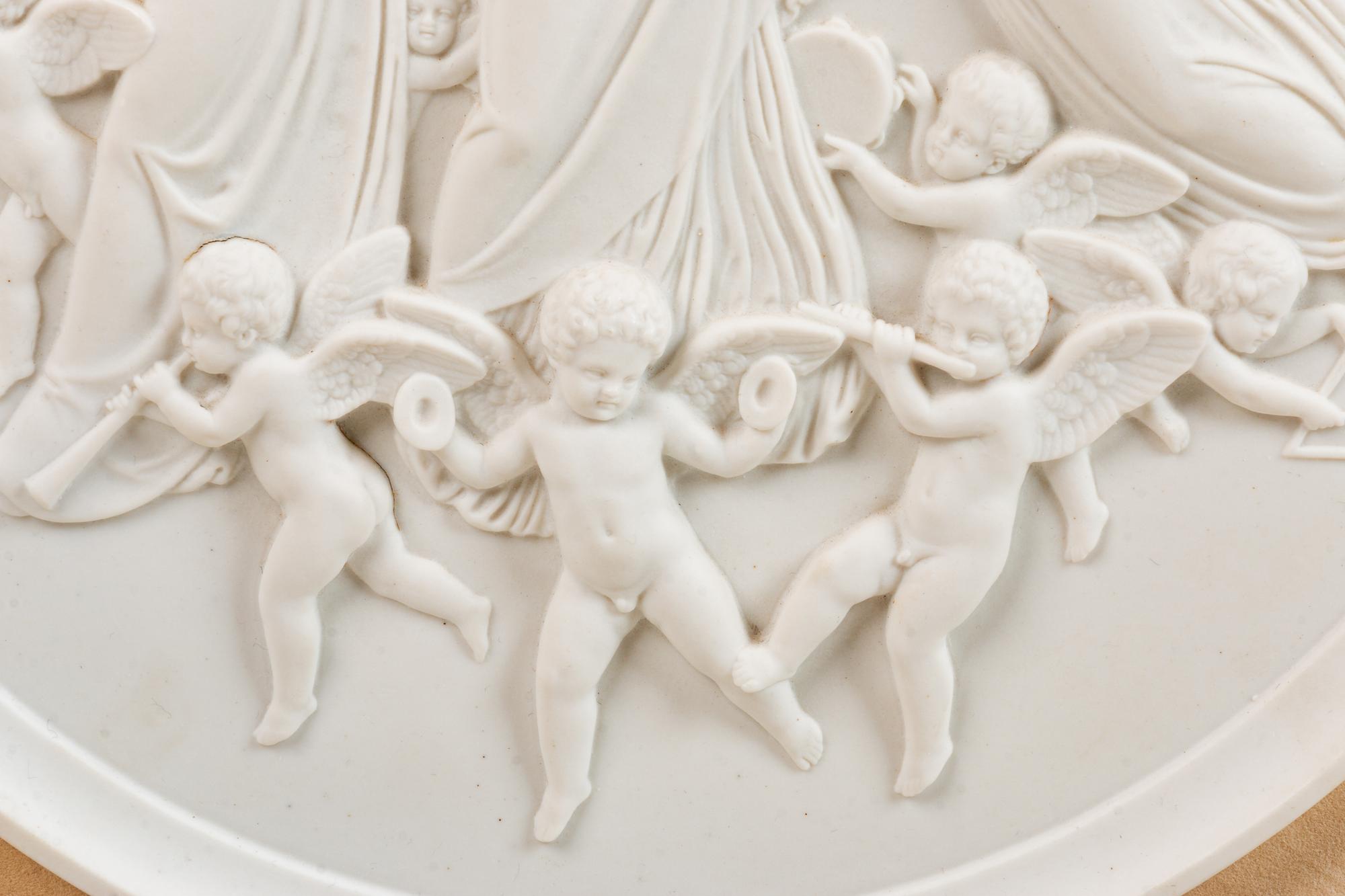 A Continental Bisque Porcelain Relief Plaque