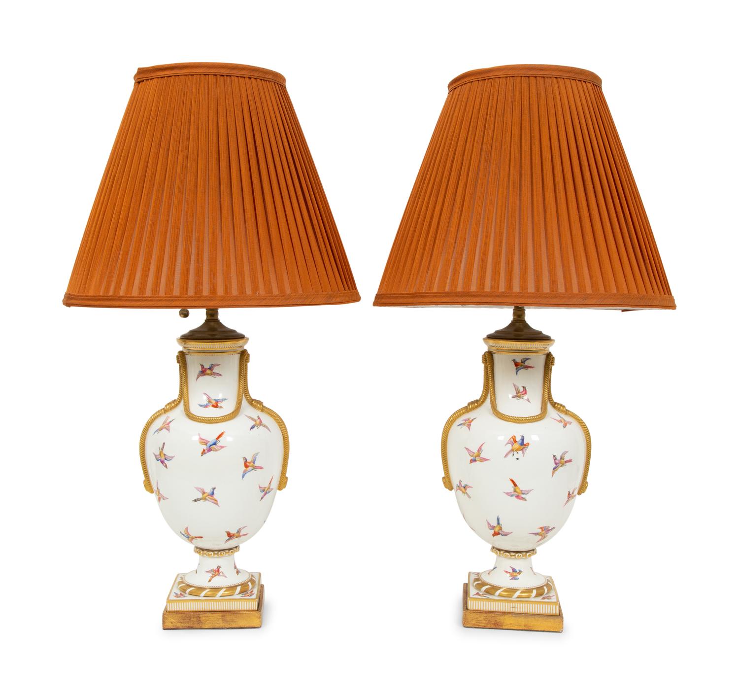 A Pair of Parcel-Gilt Painted Porcelain Table Lamps
