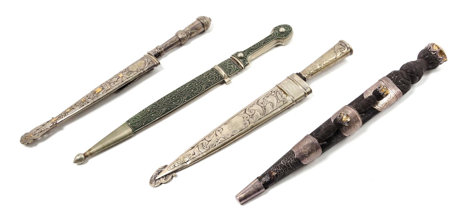 A Continental Silver-Gilt Cased Dagger Length of first 16 1/4 inches.