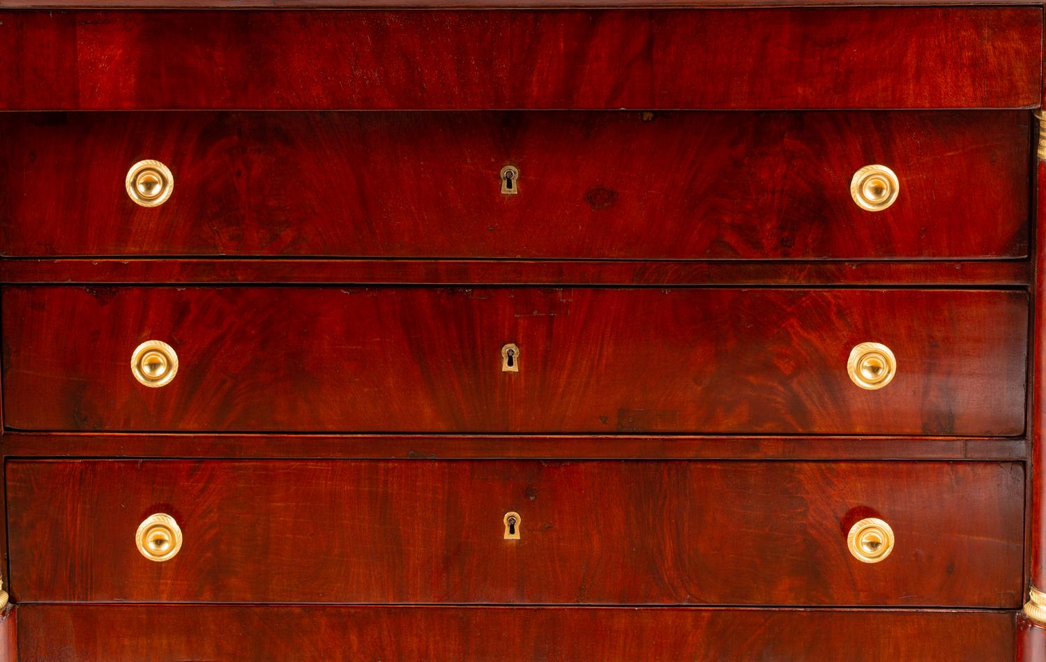 An Empire Style Gilt Bronze Mounted Mahogany Marble-Top Commode