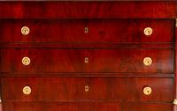 An Empire Style Gilt Bronze Mounted Mahogany Marble-Top Commode