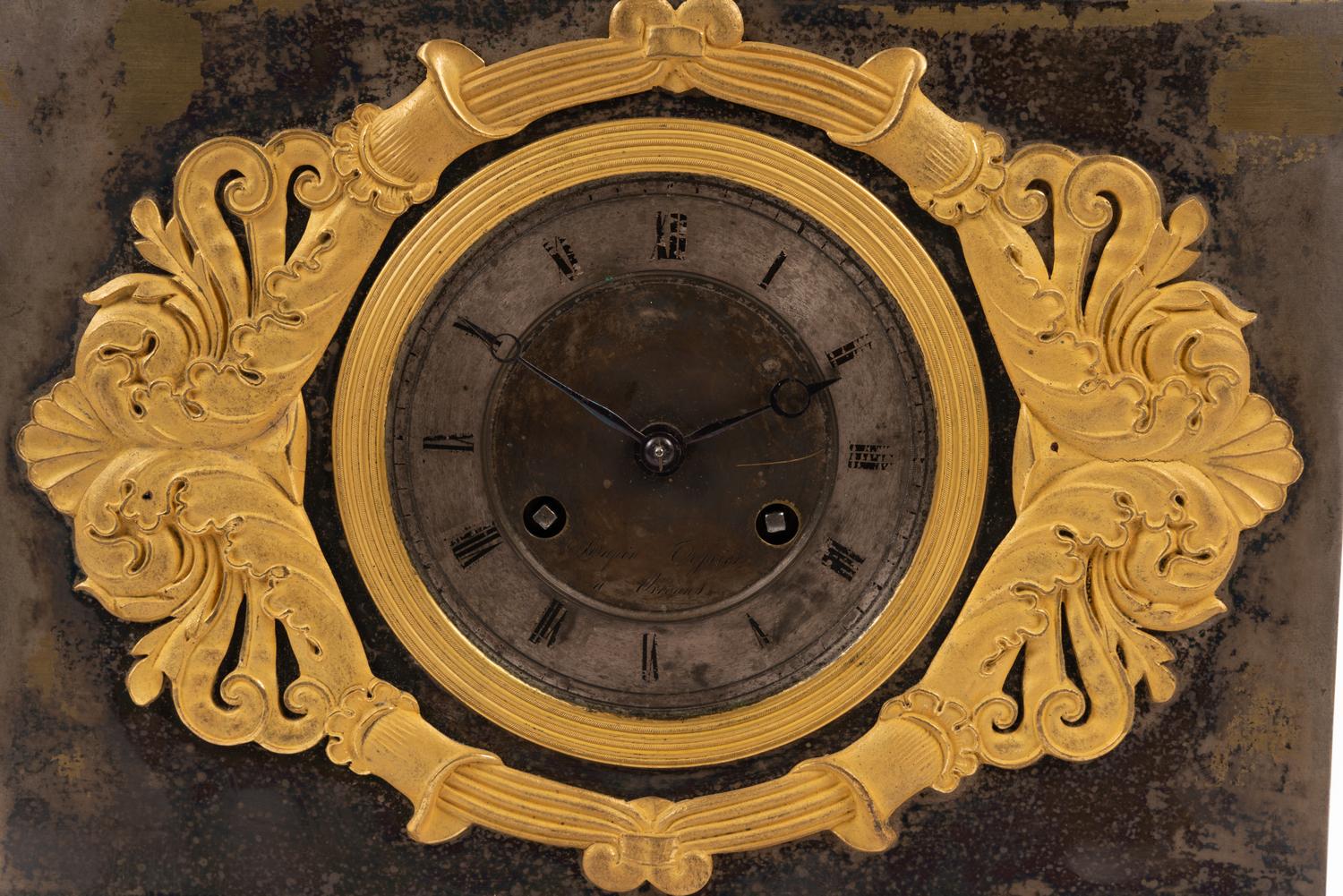 A Louis Philippe Gilt Bronze and Steel Figural Mantel Clock