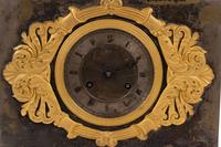 A Louis Philippe Gilt Bronze and Steel Figural Mantel Clock