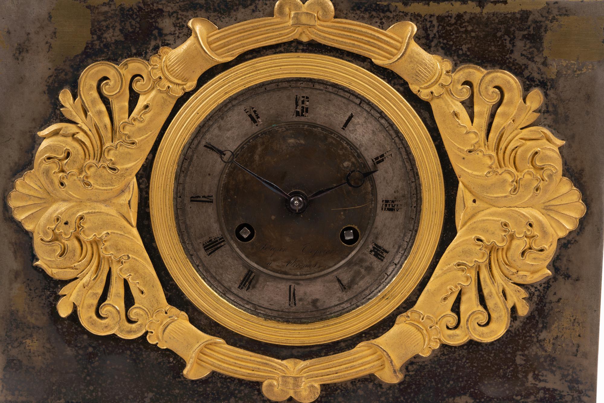 A Louis Philippe Gilt Bronze and Steel Figural Mantel Clock