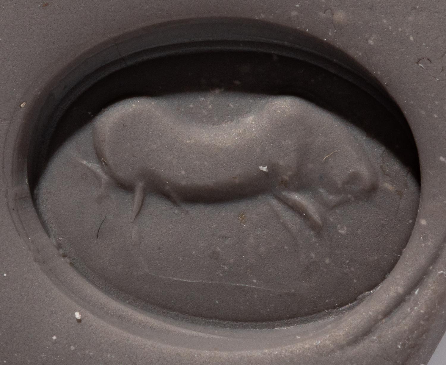 A Roman Carnelian Ring Stone with a Charging Bull