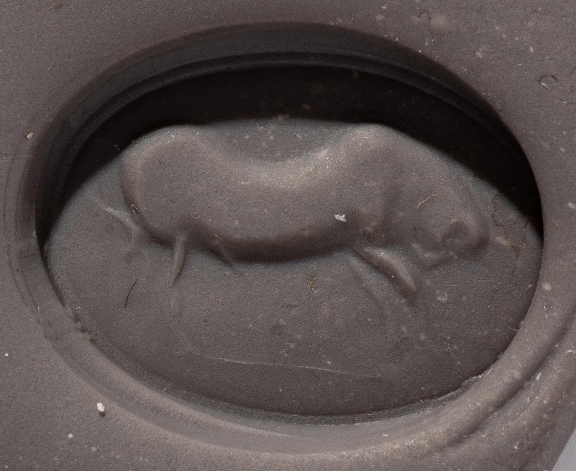 A Roman Carnelian Ring Stone with a Charging Bull