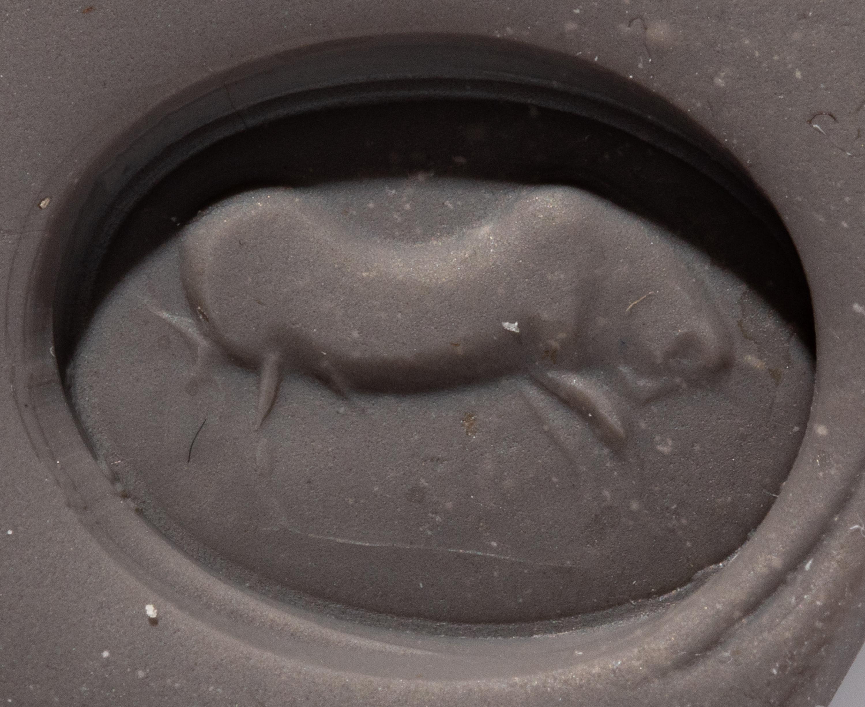 A Roman Carnelian Ring Stone with a Charging Bull