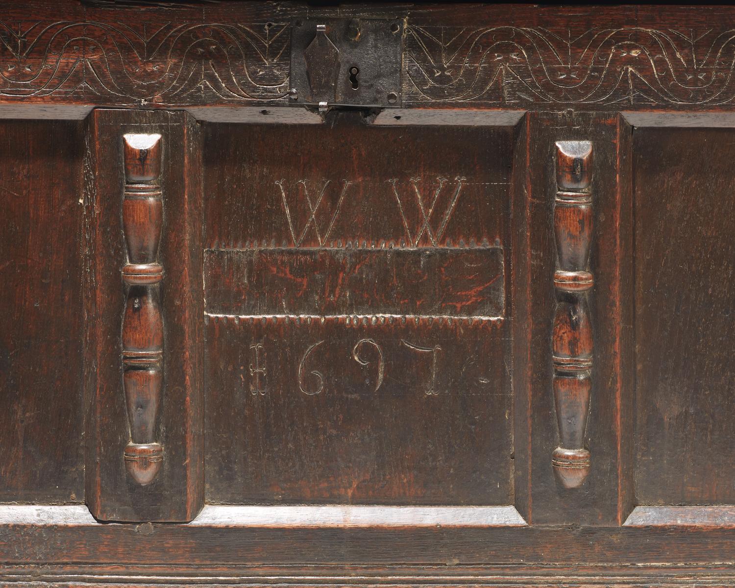 A William & Mary carved oak coffer, dated "1697"