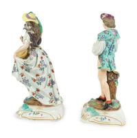 A Pair of Continental Porcelain Figures — 20TH CENTURY