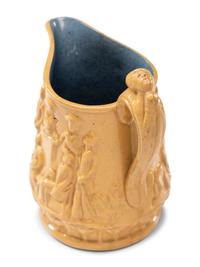 Five Graduated Abolitionist Yellowware Pitchers with Molded Scenes from Uncle Tom's Cabin