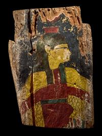 An Egyptian Painted Wood Sarcophagus Fragment with Isis