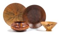 American, SECOND HALF 20TH CENTURY, a collection of four studio made wood objects, comprising 2 bowls and 2 plates