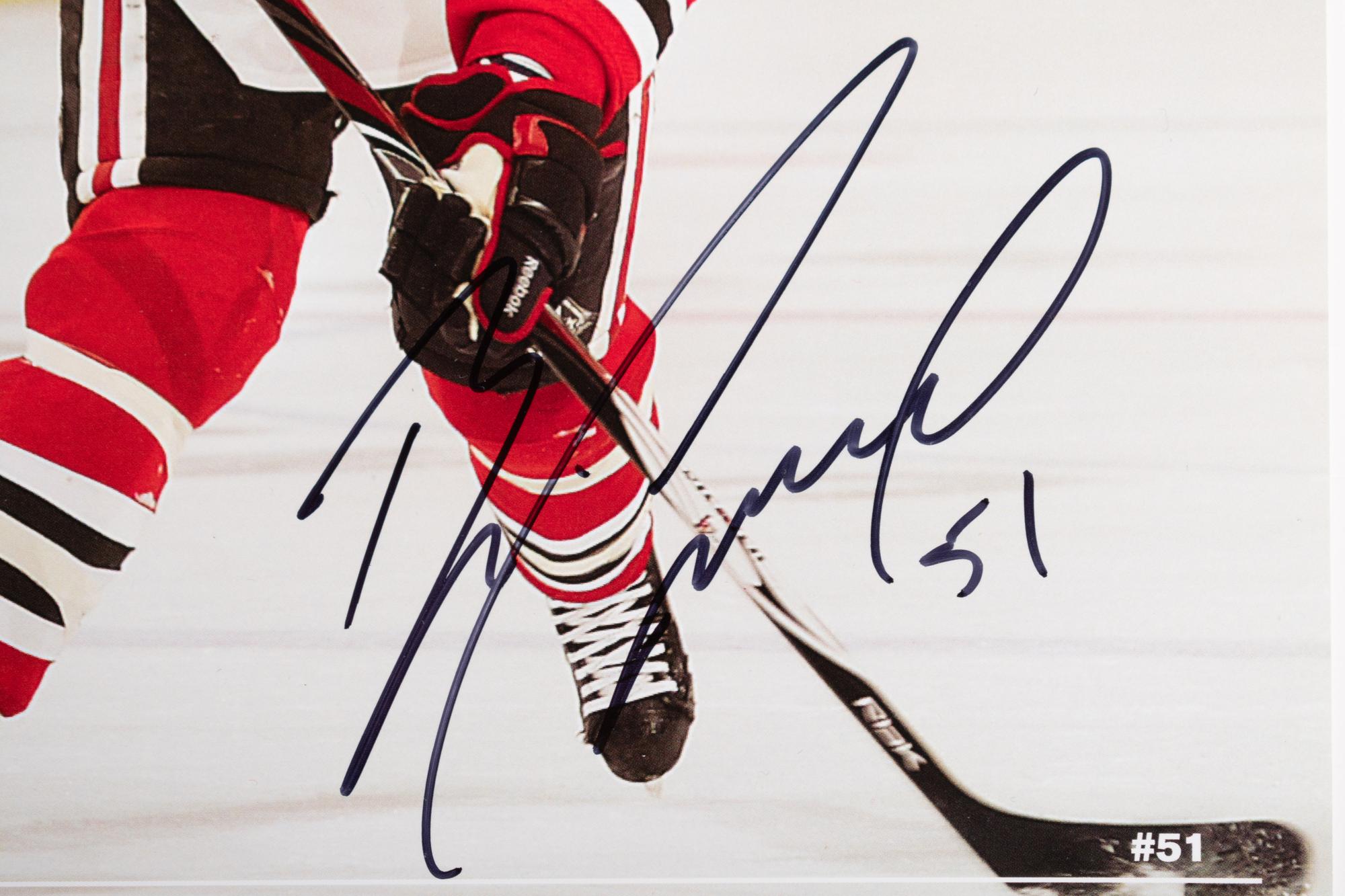 (Sports) A group of hockey memorabilia, comprising: