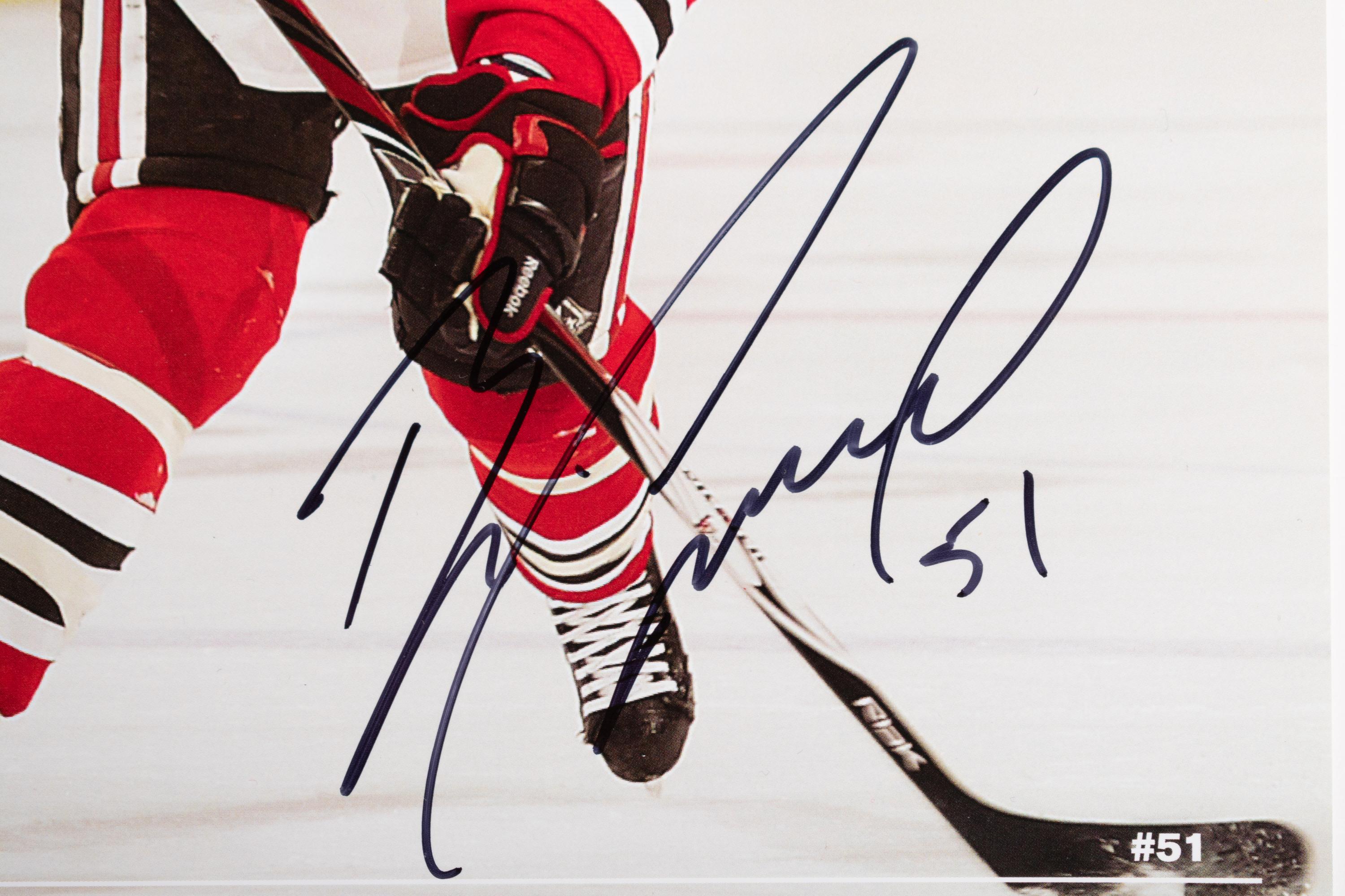 (Sports) A group of hockey memorabilia, comprising: