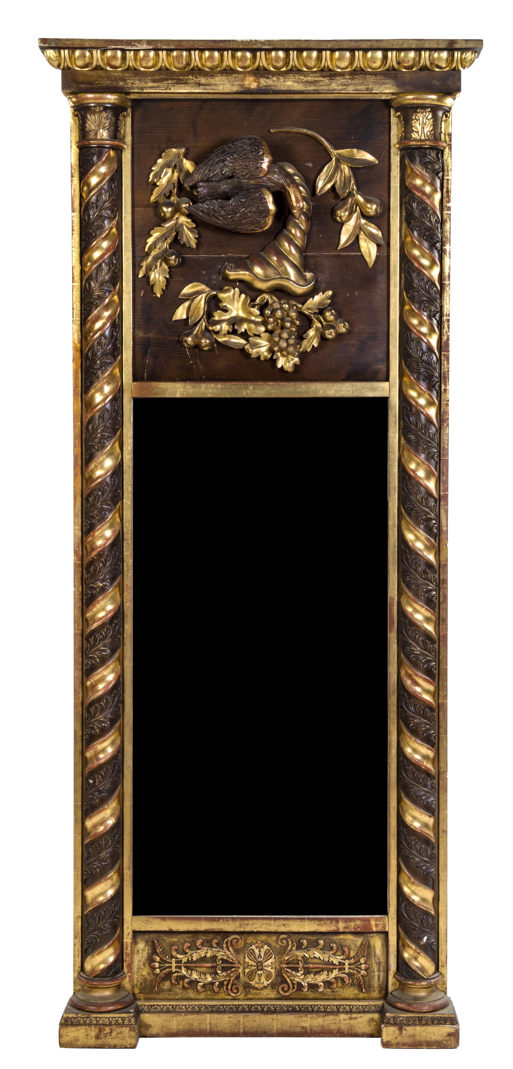 An Italian Carved and Parcel Gilt Pier Mirror Height 76 1/2 x width 32 1/2 inches. — LATE 19TH CENTURY