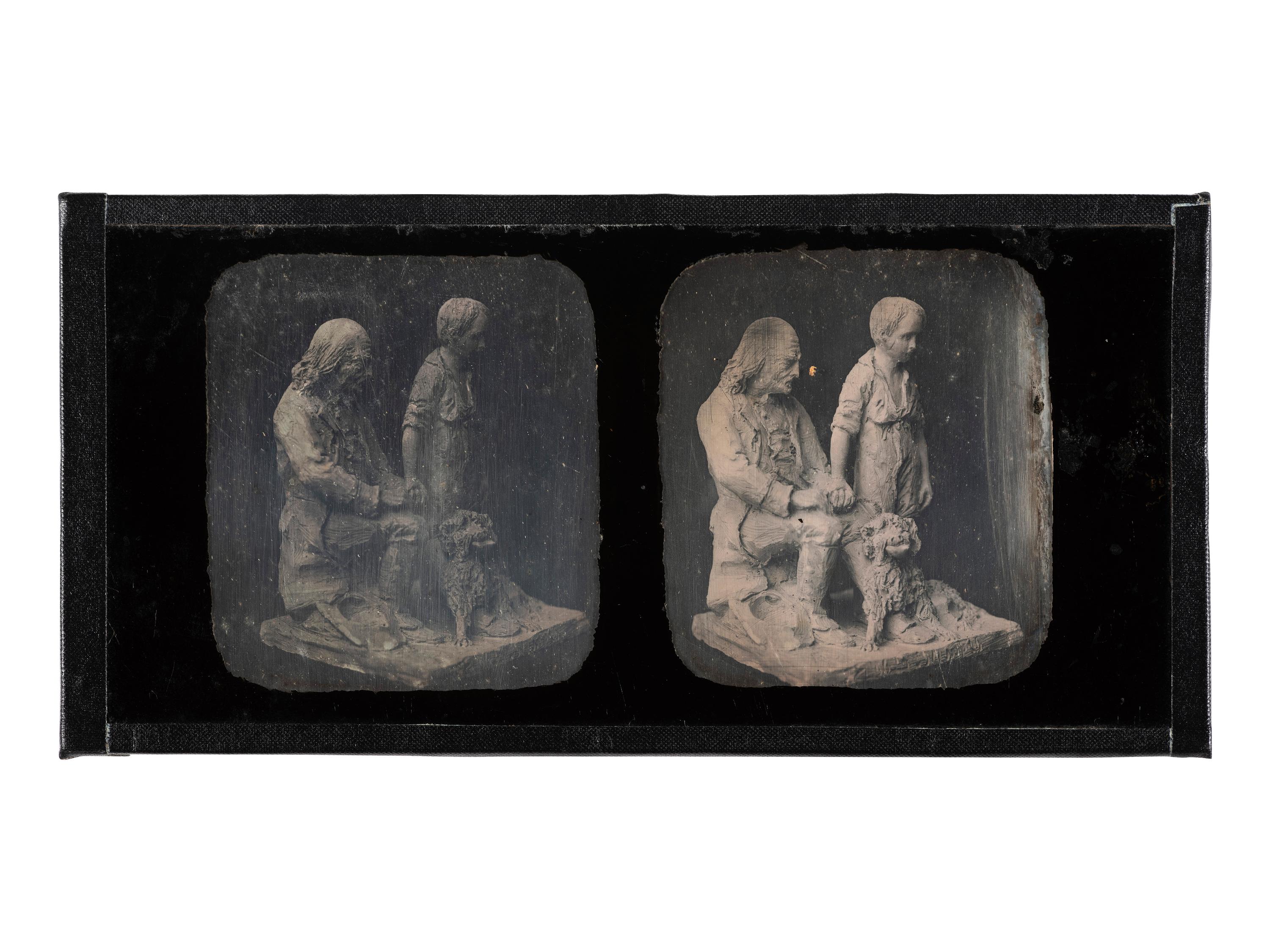 [EARLY PHOTOGRAPHY]. DUBOSCQ-SOLEIL, (Louis) Jules (1817-1886), photographer. Stereodaguerreotype of sculpture depicting man posed with young boy and dog.
