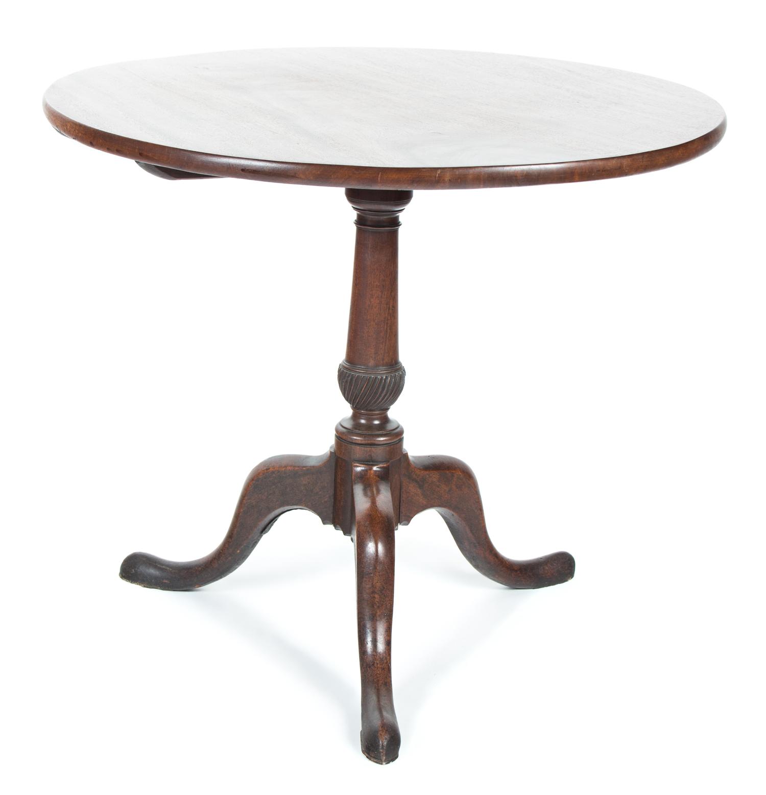 A George II Style Mahogany Tilt-Top Table Height 27 x diameter 32 inches. — 20TH CENTURY