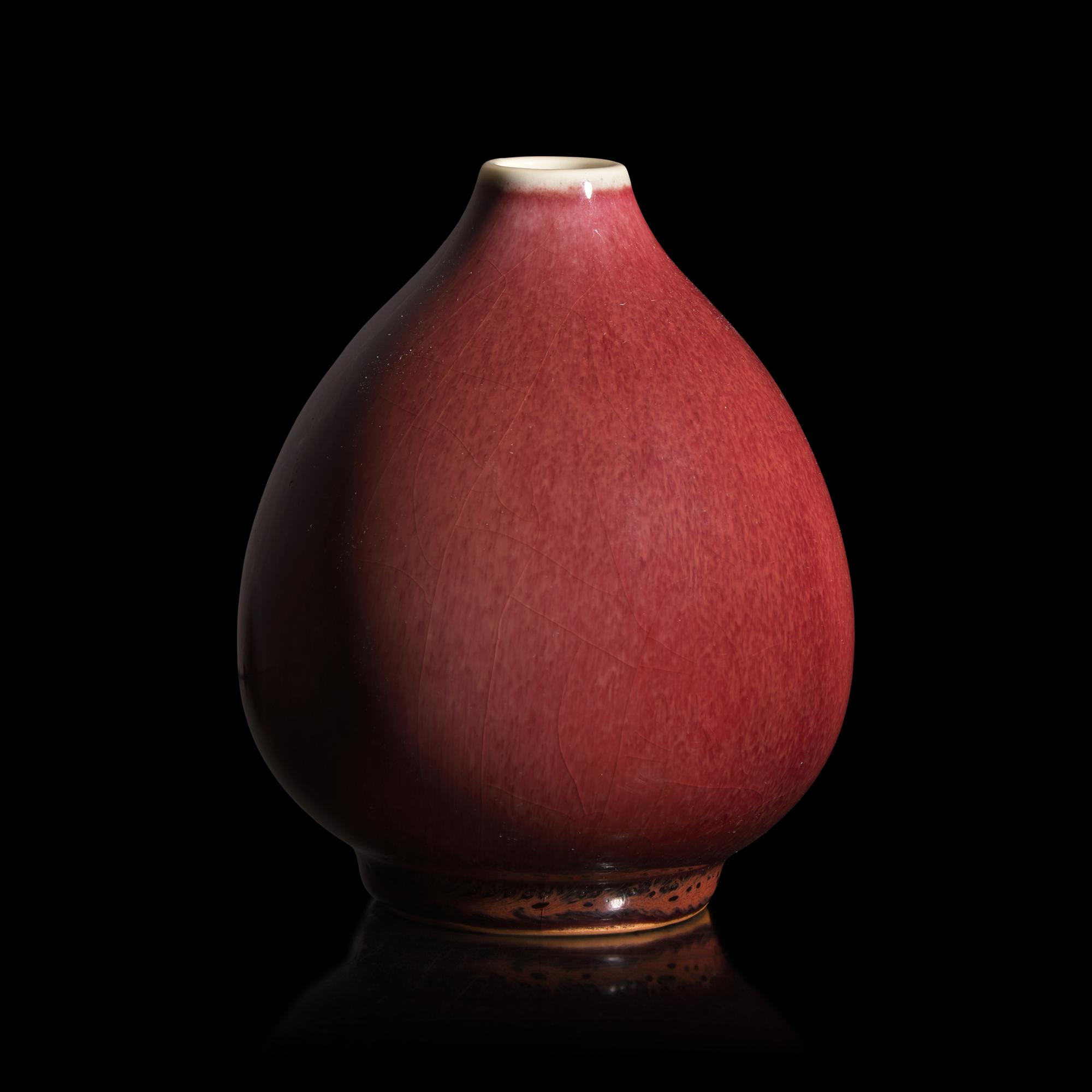 A Chinese Copper Red Glazed Porcelain Bud-Form Jar, 18th Century — 清中期 銅紅釉蓮子罐