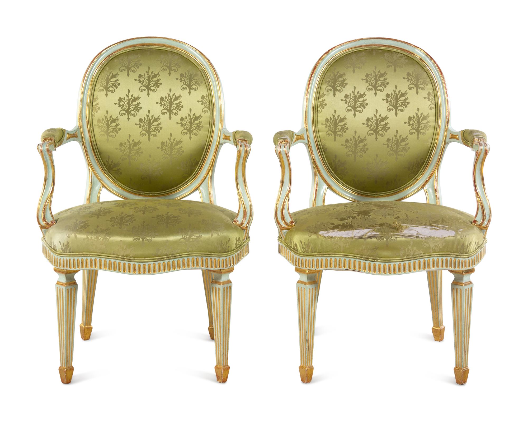 A Pair of Italian Painted and Parcel Gilt Armchairs