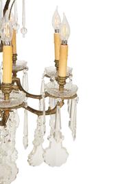 A Continental Gilt Metal and Cut Glass Eight-Light Chandelier