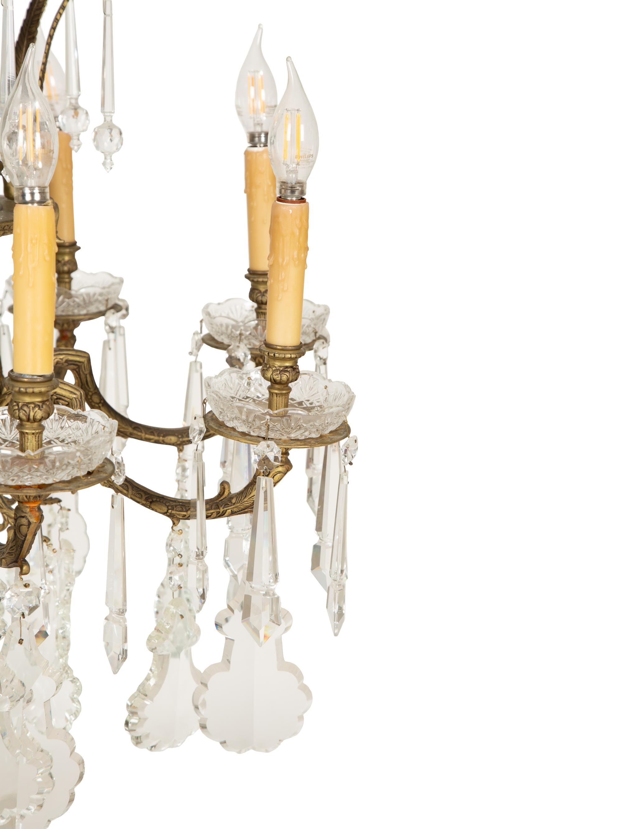 A Continental Gilt Metal and Cut Glass Eight-Light Chandelier