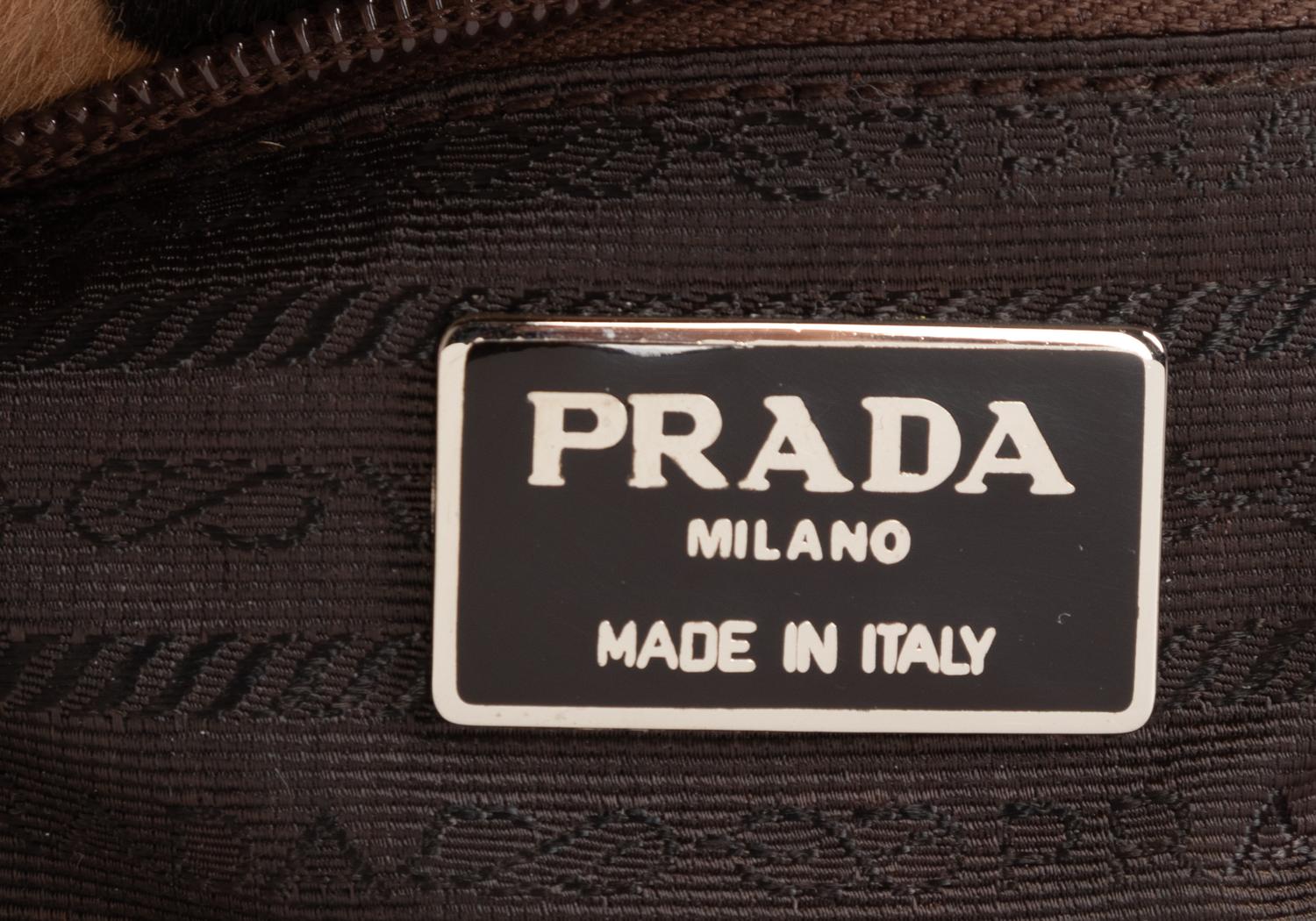Two Designer Pony Hair Bags: One Céline Leopard Print Tote and One Prada Animal Print Clutch