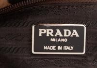 Two Designer Pony Hair Bags: One Céline Leopard Print Tote and One Prada Animal Print Clutch
