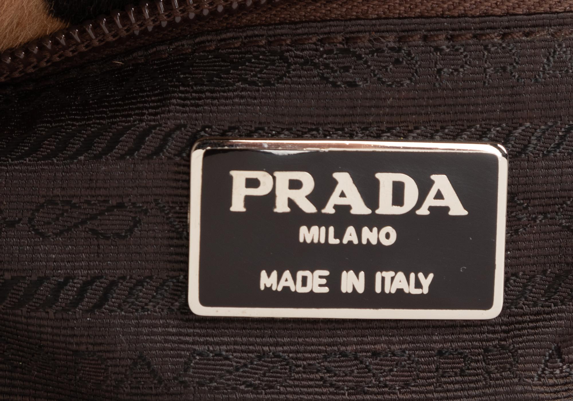 Two Designer Pony Hair Bags: One Céline Leopard Print Tote and One Prada Animal Print Clutch
