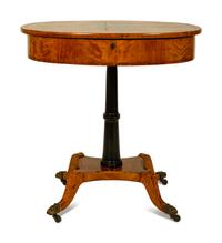 A Regency Inlaid Satinwood, Ebonized and Parcel Gilt Oval Work Table — EARLY 19TH CENTURY