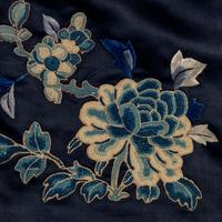Two Chinese Midnight-Blue Ground Embroidered Silk Lady's Robes, 19th Century 清晚期 石青地綉花女褂兩件
