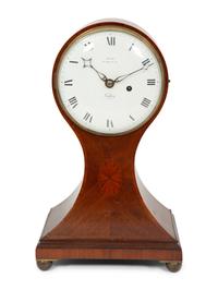 A Victorian Mahogany Balloon Clock