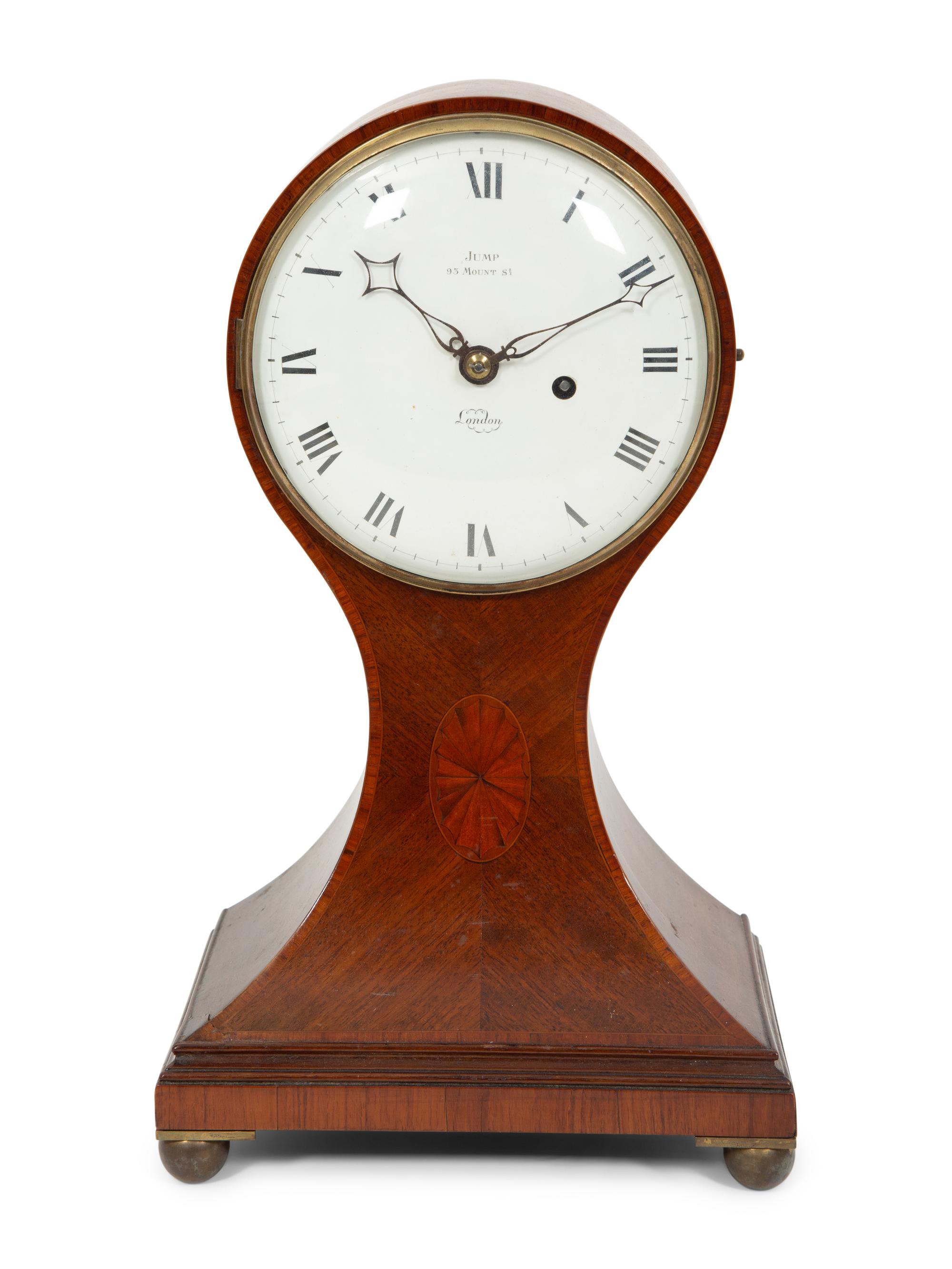 A Victorian Mahogany Balloon Clock