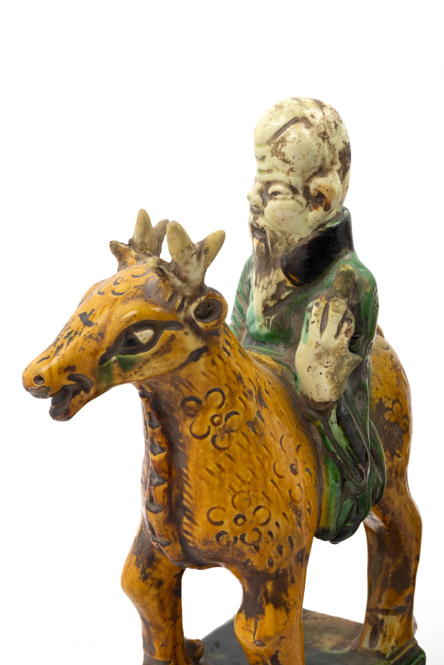 A Pair of Chinese Sancai Glazed Pottery Shoulou Form Censers