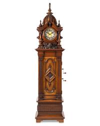 A Symphonion Style 38B Eroica Upright Three Disc Music Box with Clock