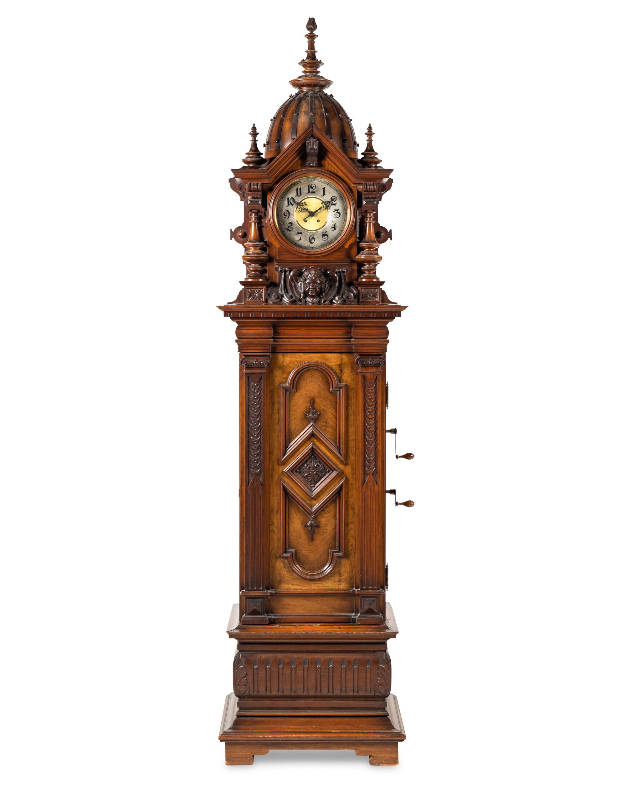 A Symphonion Style 38B Eroica Upright Three Disc Music Box with Clock