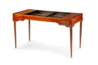 A Louis XVI Tooled-Leather Upholstered Mahogany Tric-Trac Table