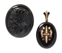 A Victorian Onyx and Seed Pearl Mourning Pendant, 30.50 dwts.