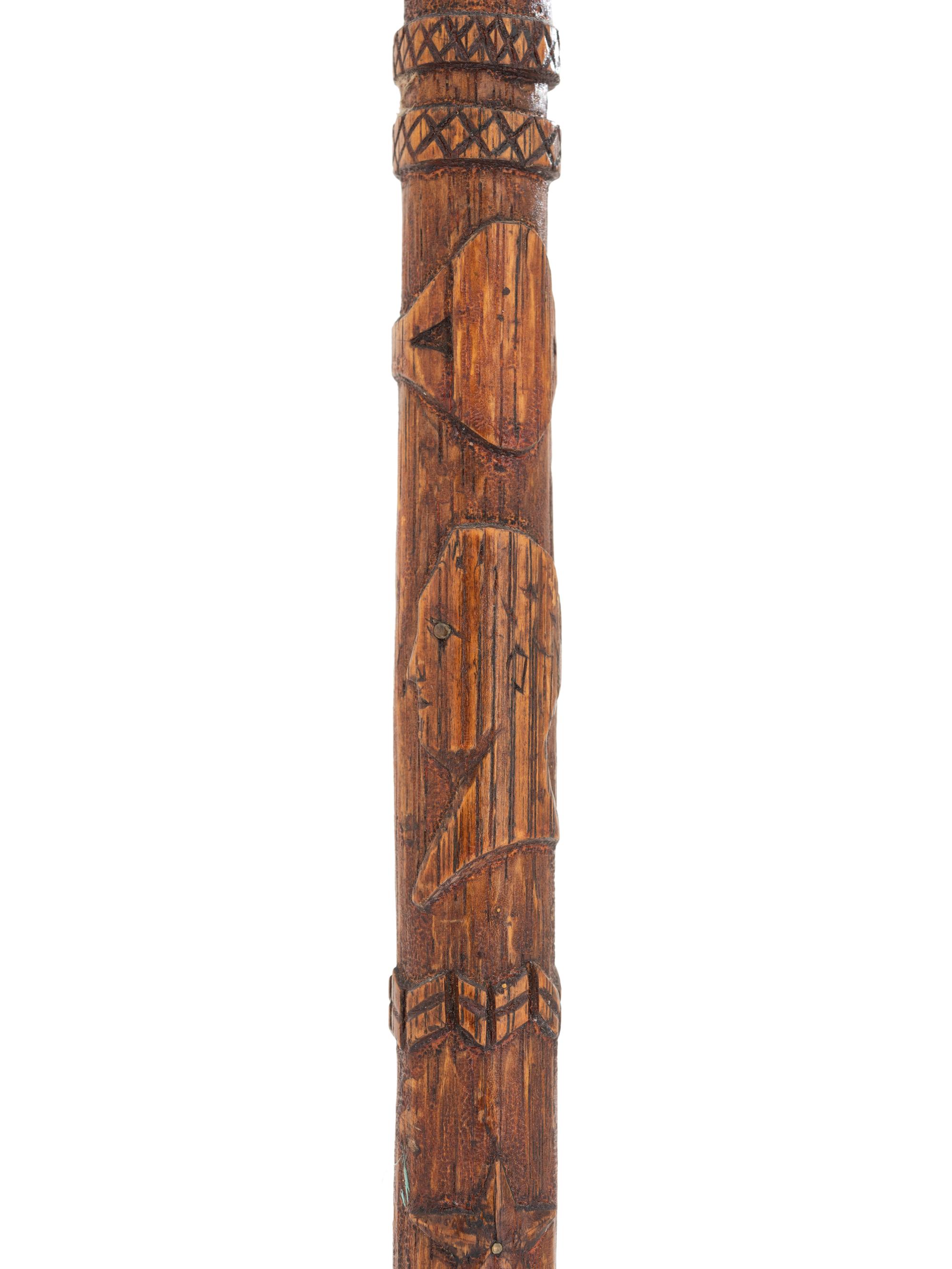 [CIVIL WAR]. GAR folk art carved cane featuring corps badges and patriotic motifs.