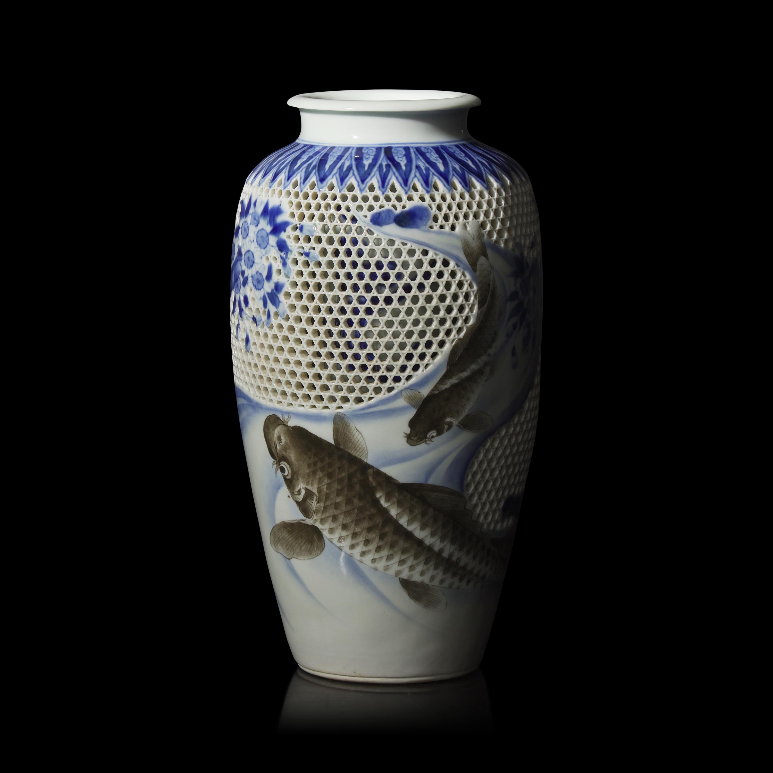 A Japanese Hirado Blue and White Porcelain Reticulated Double-Walled 'Koi and Flowers' Vase, Meiji/Taisho Period 日本明治/大正時期 平戶燒青花鯉魚圖賞瓶