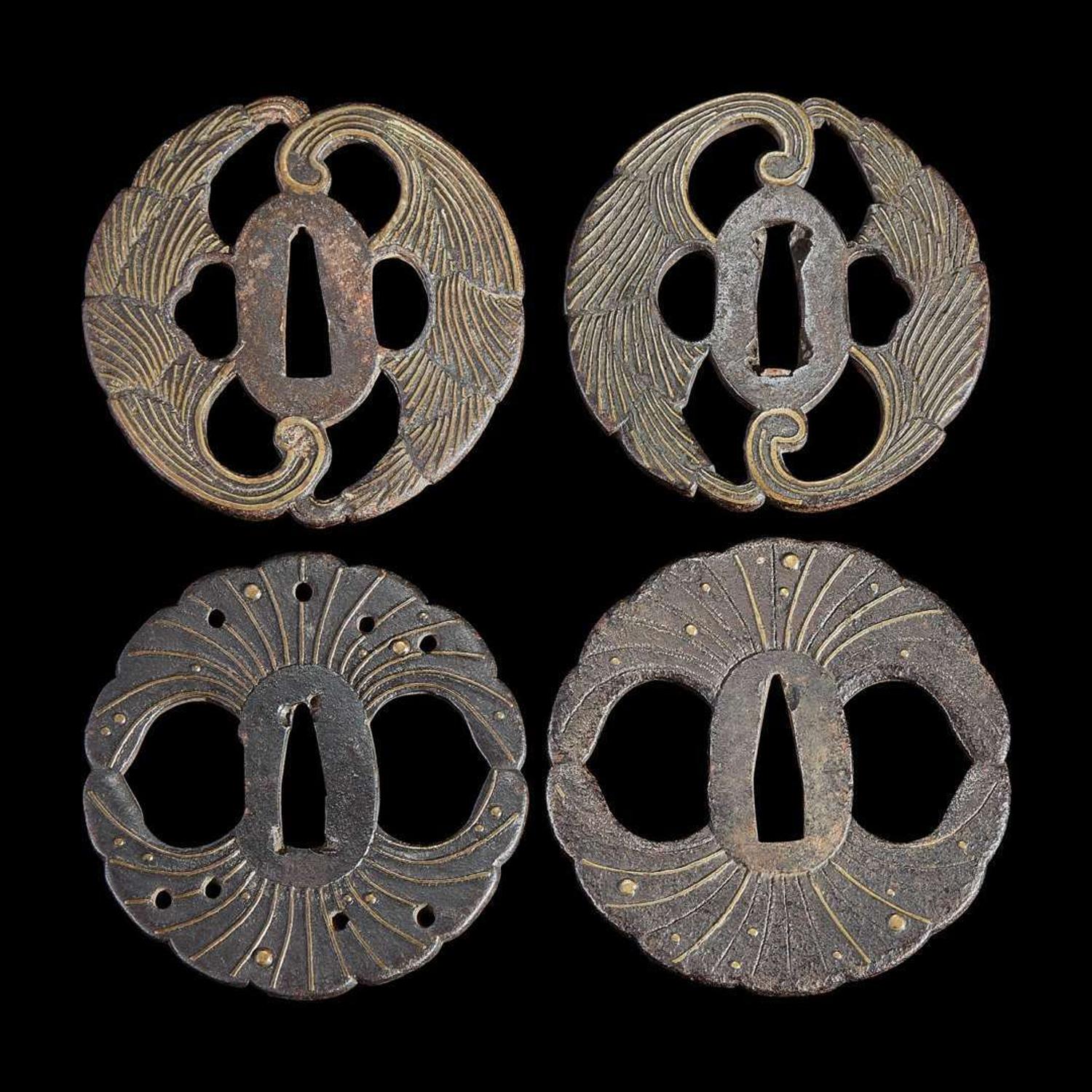 Group of eight assorted Japanese tsuba Meiji period and earlier