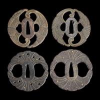 Group of eight assorted Japanese tsuba Meiji period and earlier