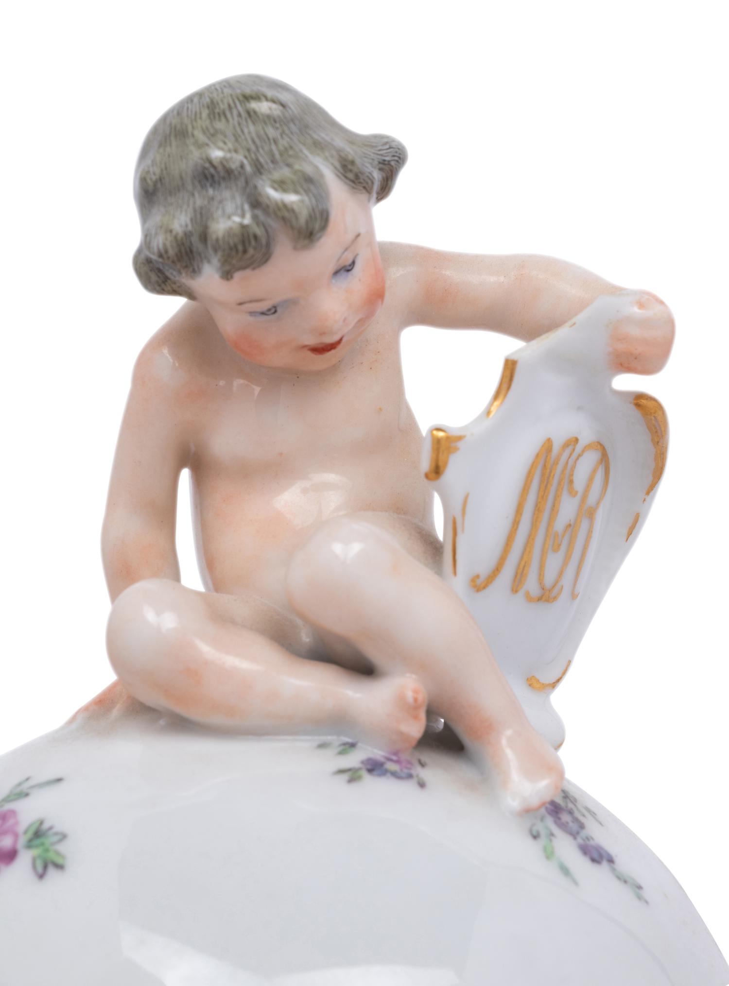 A Royal Copenhagen Porcelain Cup and Cover
