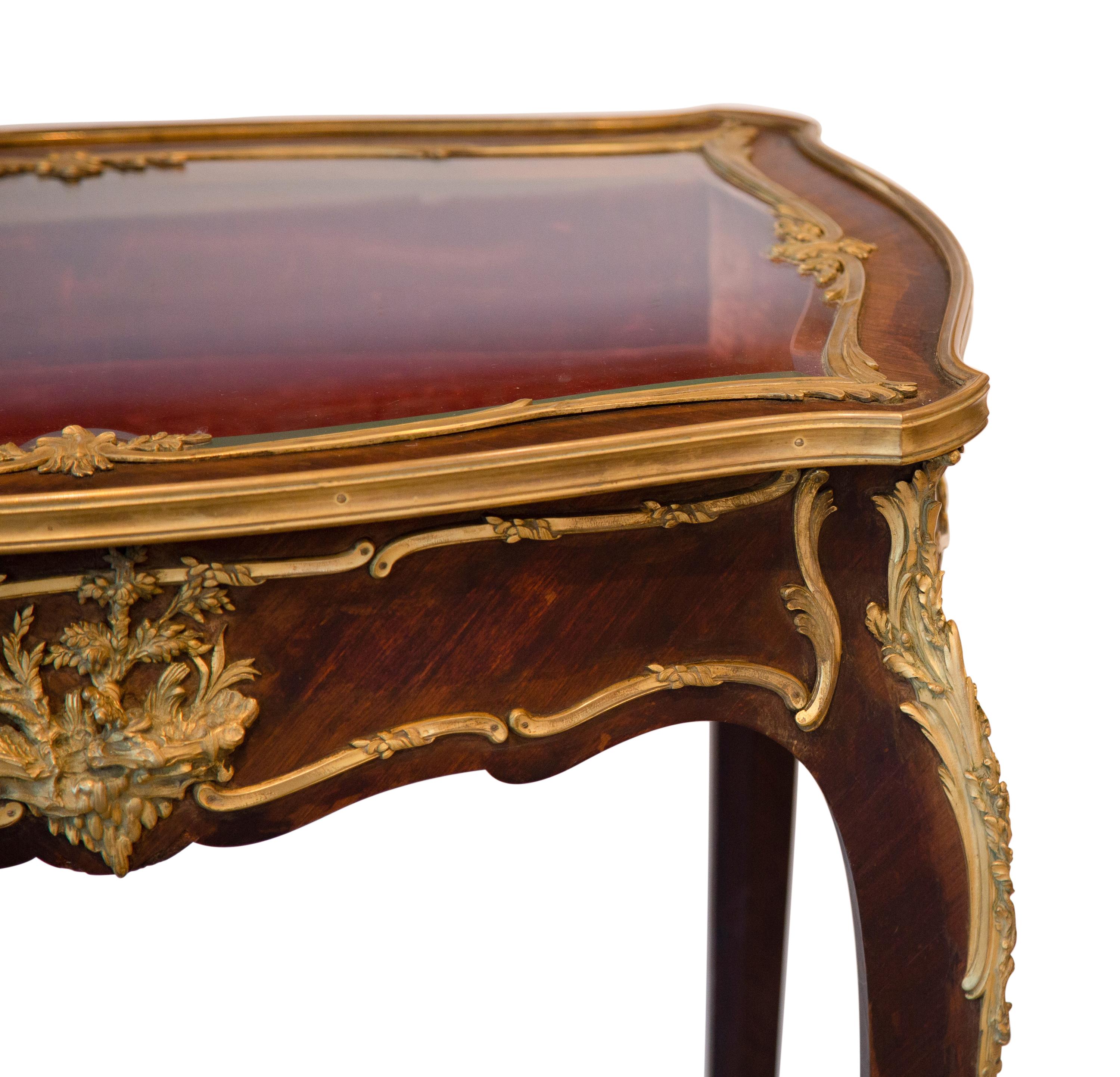 A Louis XV Style Gilt Bronze Mounted Vitrine Table
