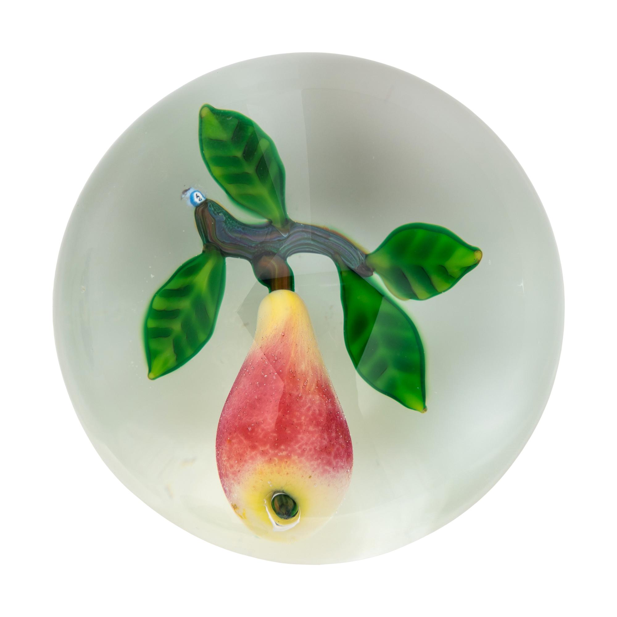 A Two Plums Glass Paperweight, a Chinese Pansy and Bud on Latticino Basket Glass Paperweight and a Pear Glass Paperweight