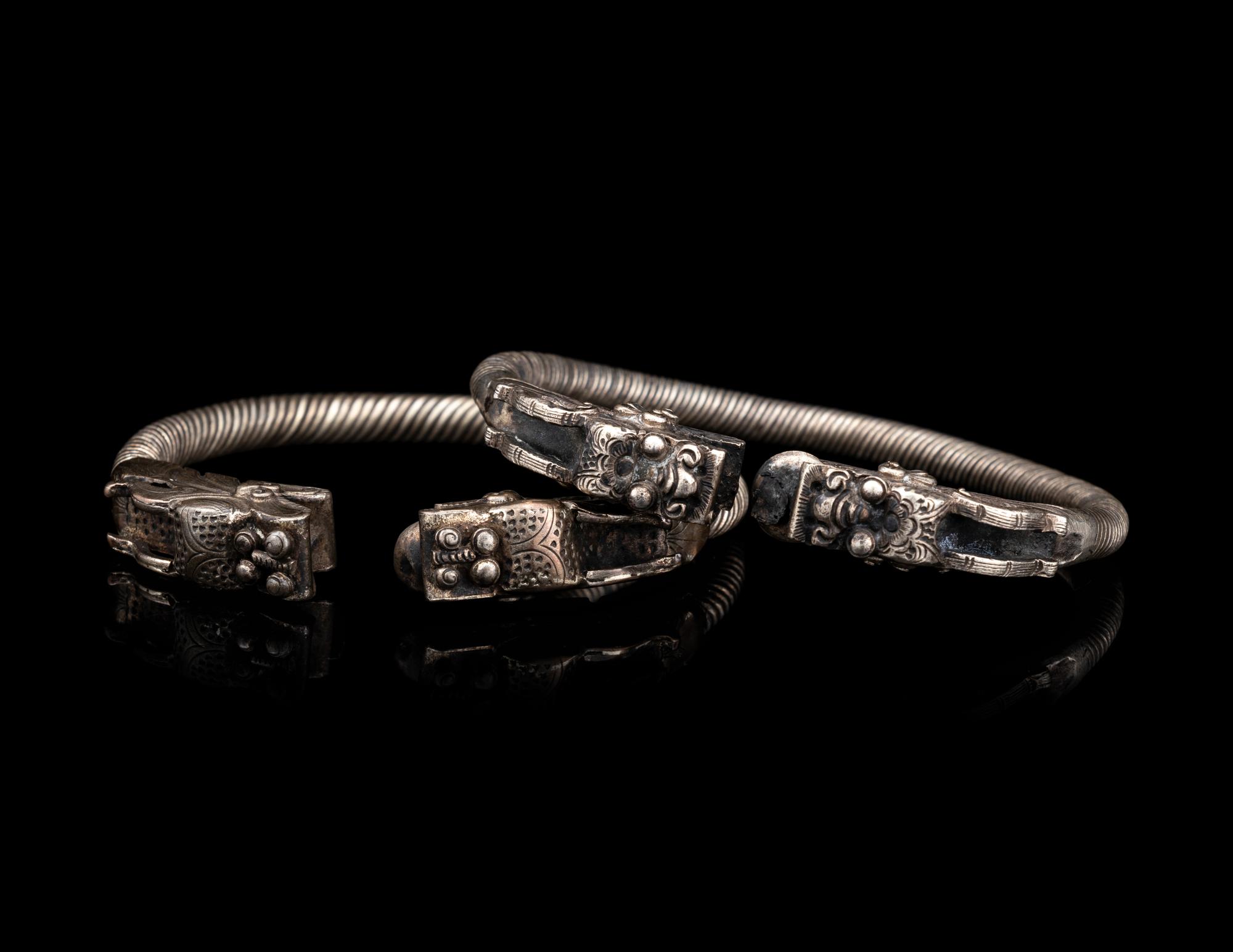 A Pair of Chinese Silver 'Dragon' Bangles