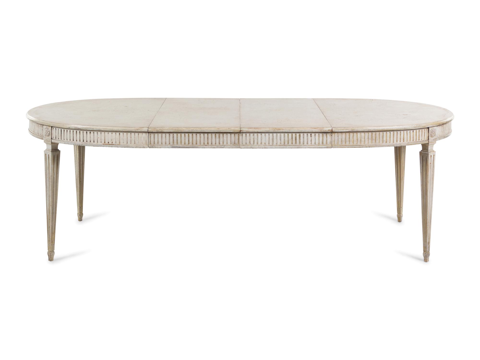A Louis XVI Style Painted Dining Table