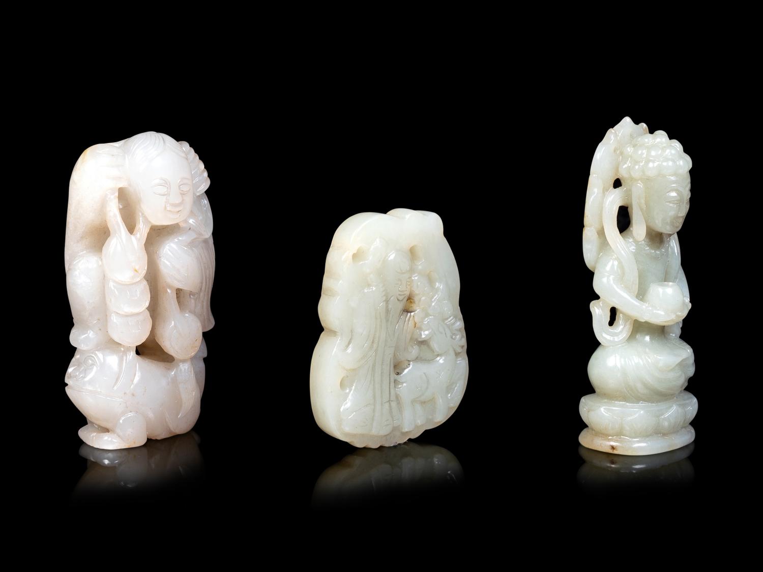 Three Chinese Celadon Jade Carved Figures of Immortals
