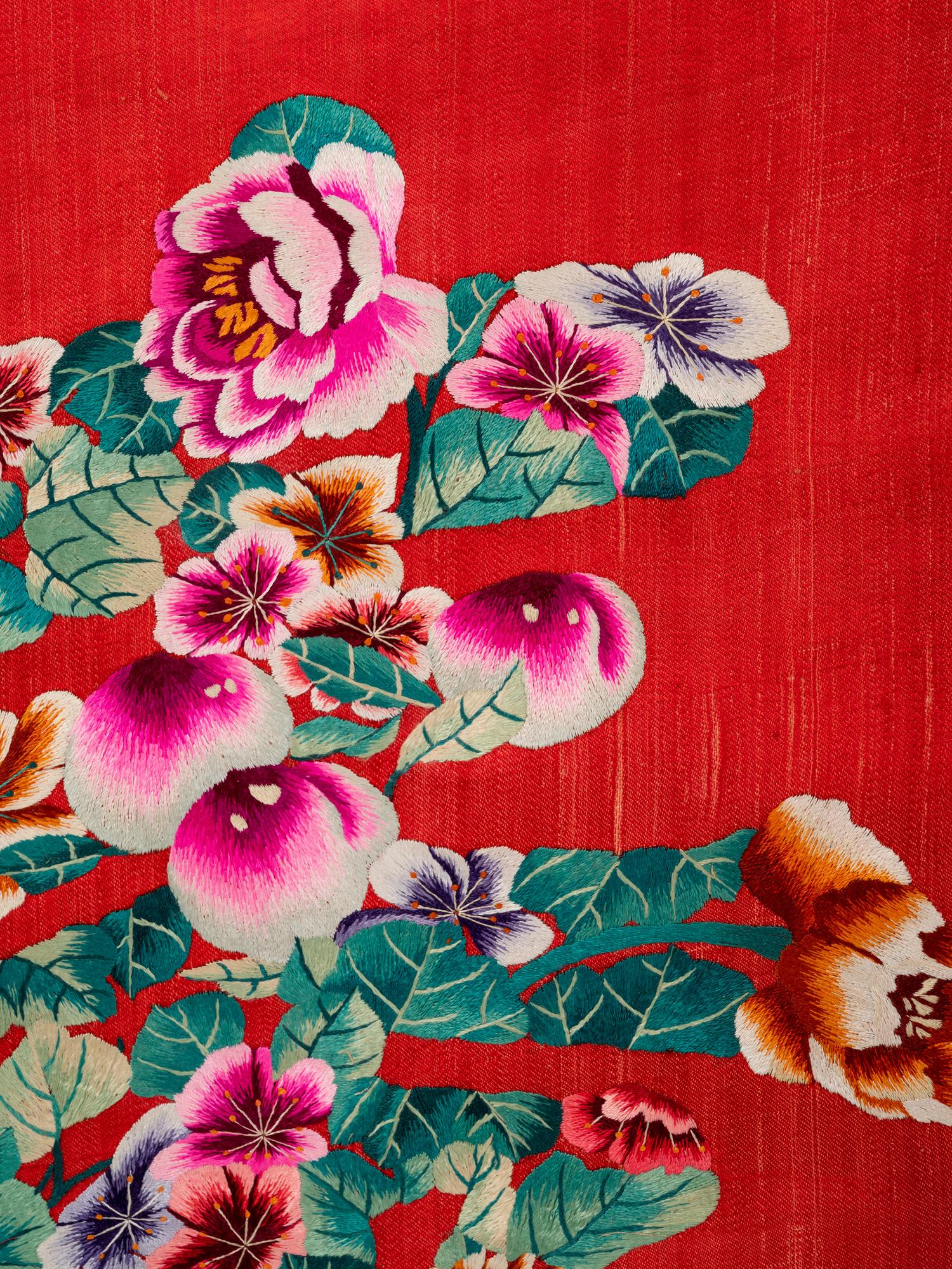 Two Chinese Red Ground Embroidered Silk 'Longevity' Panels