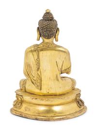 A Sino-Tibetan Gilt Bronze Seated Figure of Buddha Shakyamuni